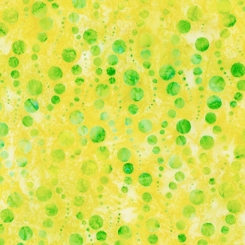 Dottie - Pineapple is a bubbly design in lime green on a juicy pineapple yellow background, featuring rising bubbles in a wavy pattern. 