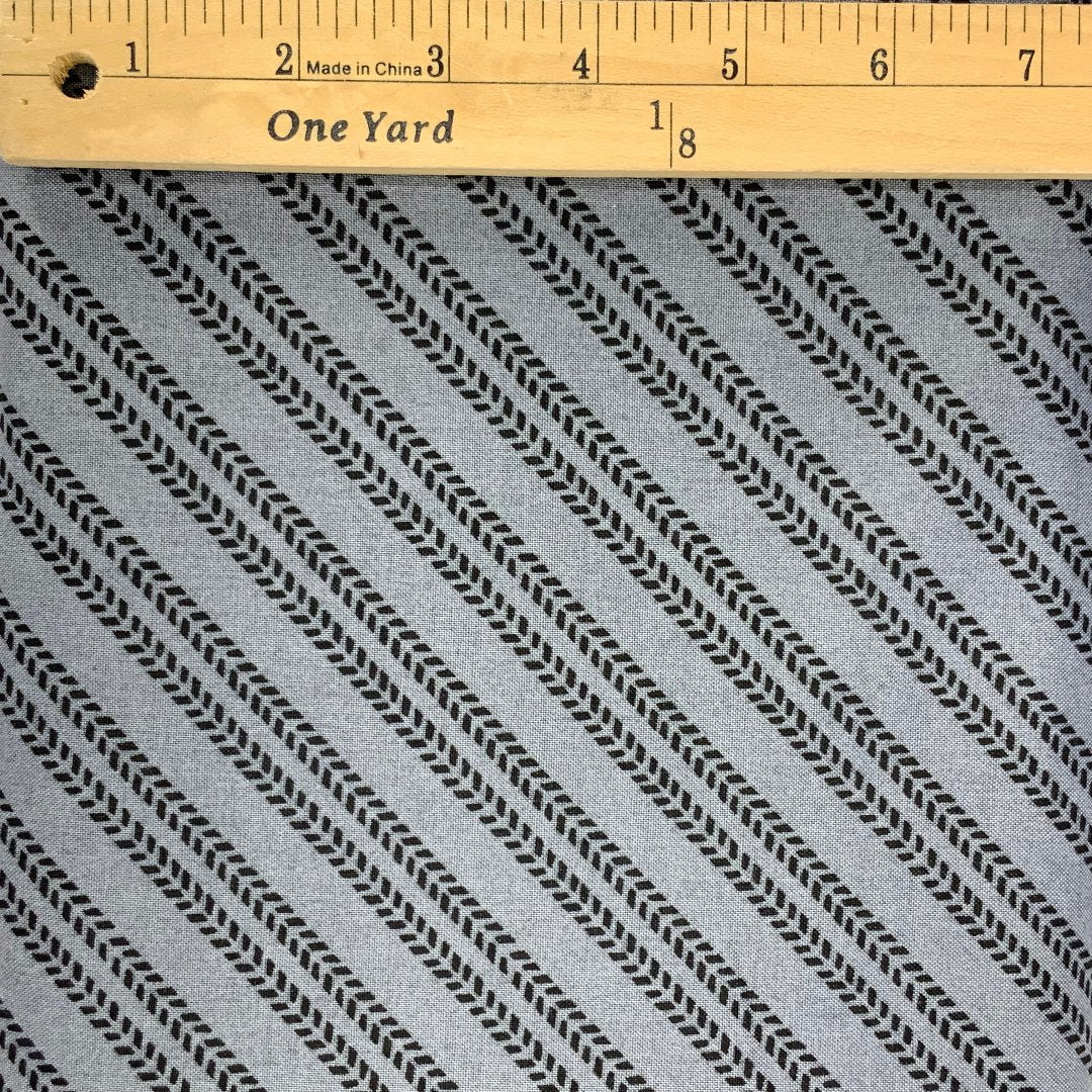 A truck track design in black and grey . Some fabrics do not photograph as they actually look.