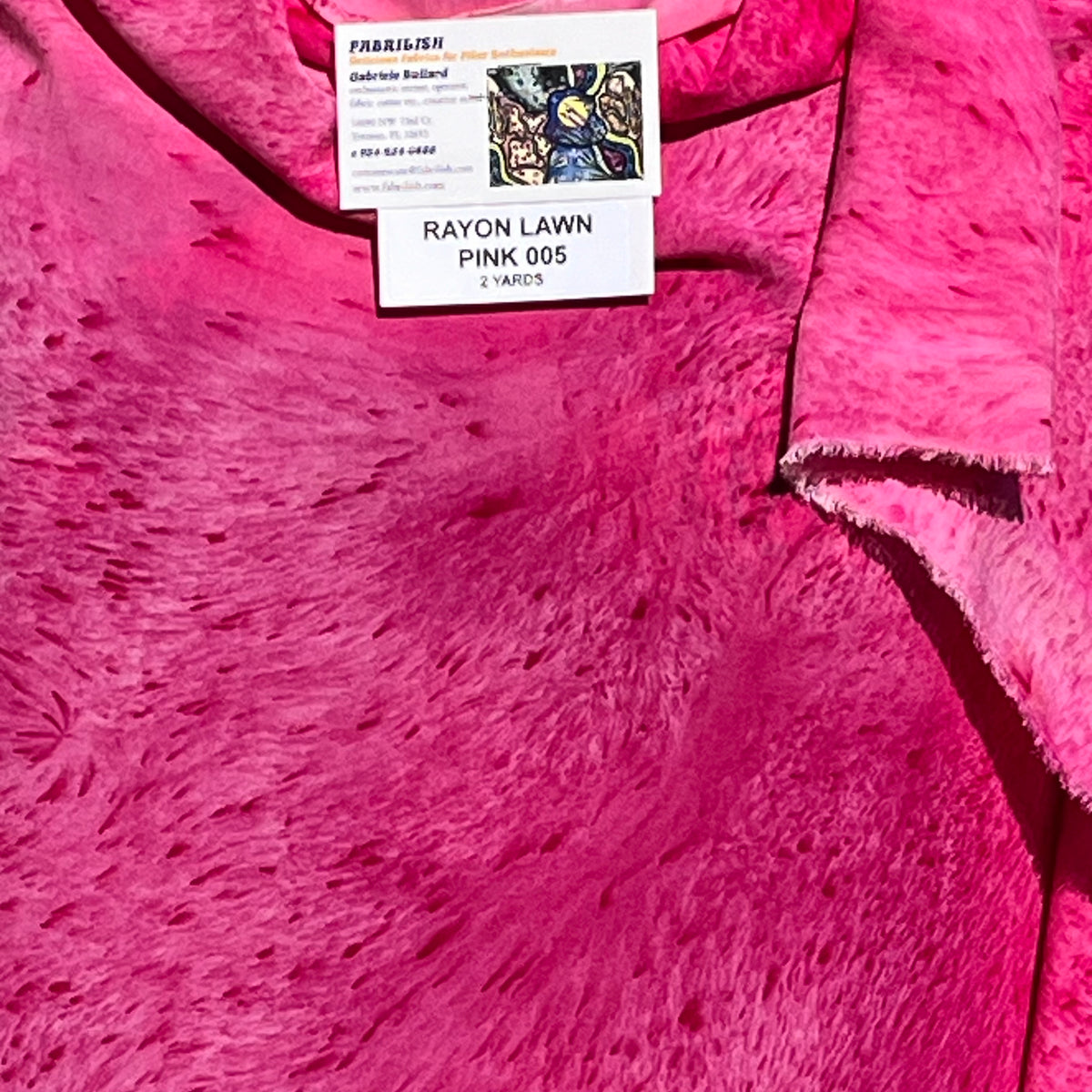 A SPLADDER DYED PINK PIECE OF FABRIC