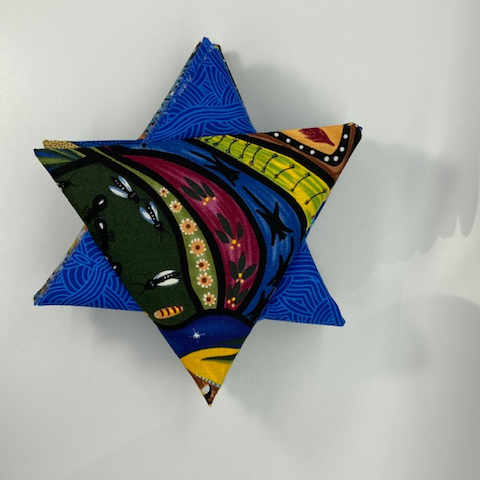 This picture shows a lovely collection of Australian Aboriginal cotton fabrics in various shades of blues.