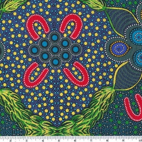 Leaves and Fruit blue gold is a large design by aboriginal artist Jocelyn Bird in blues, golden yellows, green and red with a very large 23.75" repeat.