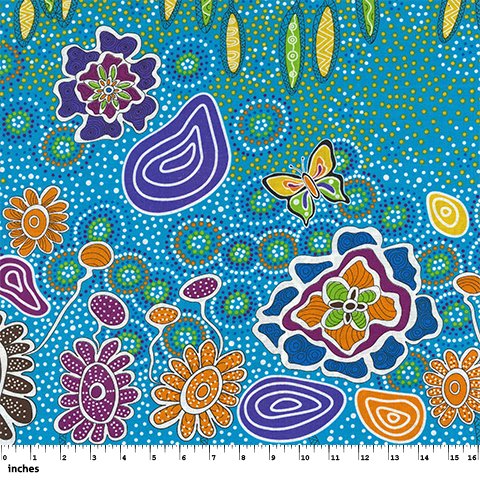 Summertime Rainforest blue Australian Aboriginal fabric by Heather Kennedy is a delightful representation of colorful flowers and butterflies on a bright blue background.