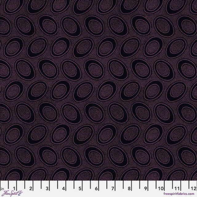 Tiny pinkish purple dots arranged in ovals, on a black background, reminiscent of Australian aboriginal art. 