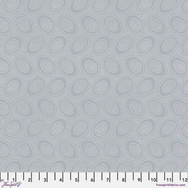 Tiny white dots arranged in ovals, on a taupish greybackground, reminiscent of Australian aboriginal art.