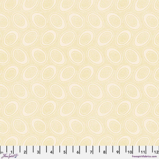 Tiny mustardy yellow dots arranged in ovals, on a cream colored background, reminiscent of Australian aboriginal art. 