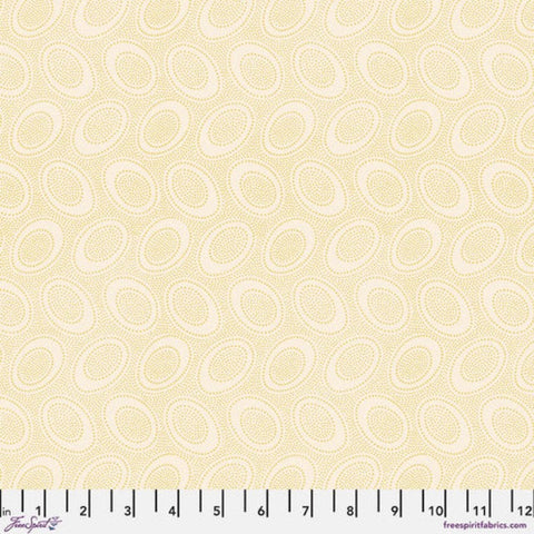 Tiny mustardy yellow dots arranged in ovals, on a cream colored background, reminiscent of Australian aboriginal art. 