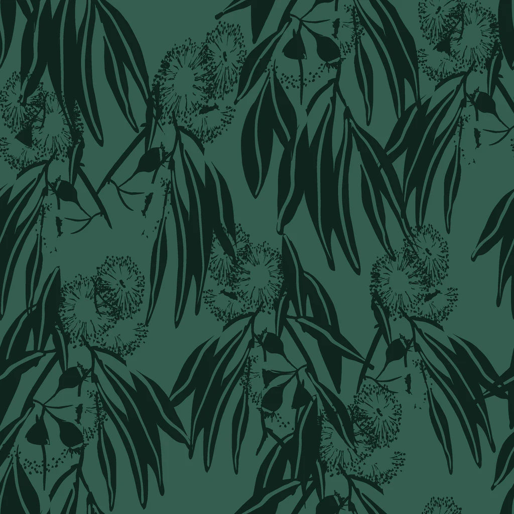 A realistic-looking floral design, depicting Eucalyptus leaves, flowers and fruit in black on a bush green background.