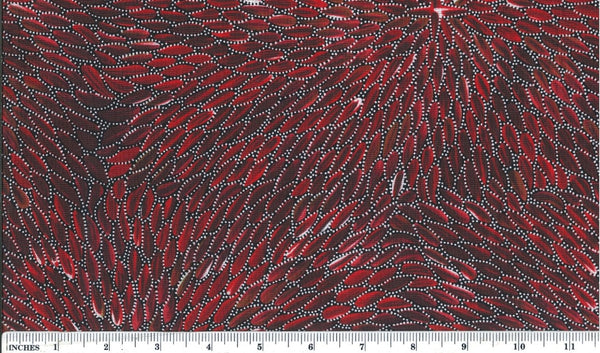  This 100% fine cotton fabric features delicate white dots arranged in leaf patterns against a rich red and burgundy background. 