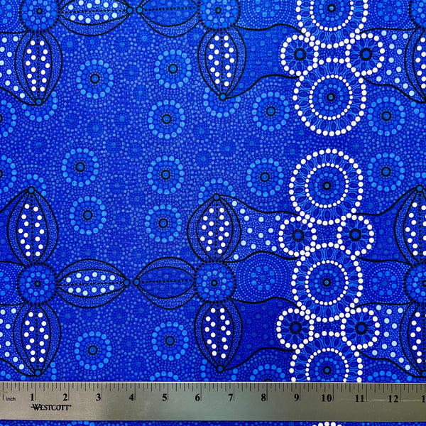 Campsite blue is a striking design in several brilliant shades of blue with white circle accents by Aboriginal Artist Bernadine Wallace.