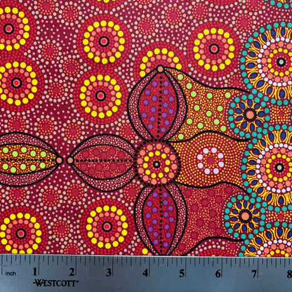 Campsite red is a striking design in vibrant shades of red, green and yellow with white circle accents by Aboriginal Artist Bernadine Wallace.