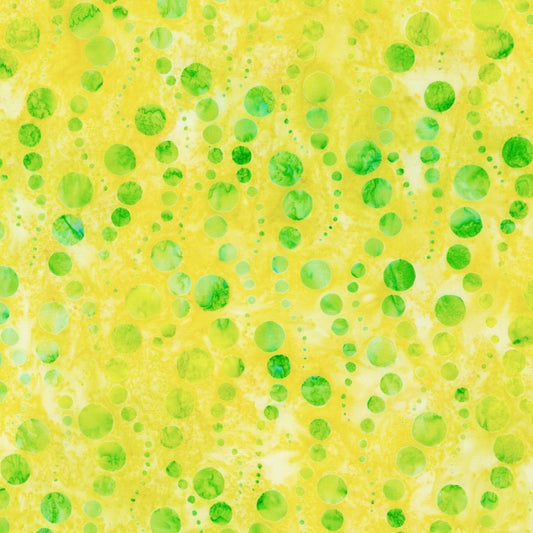 Dottie - Pineapple is a bubbly design in lime green on a juicy pineapple yellow background, featuring rising bubbles in a wavy pattern. 