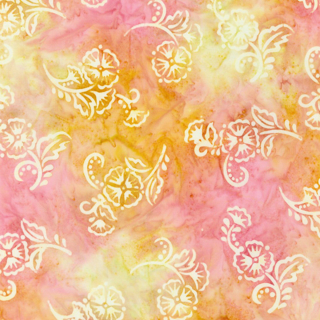 Patterned fabric with floral designs on a pink and yellow background