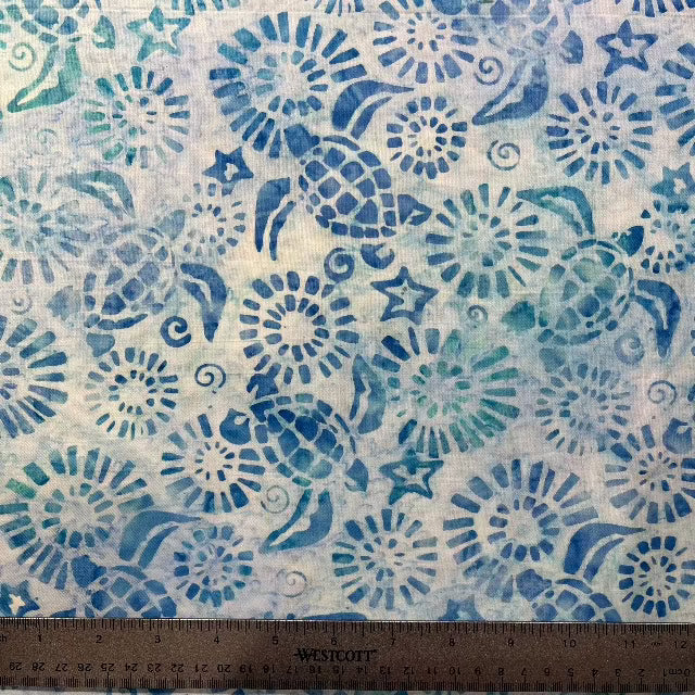 Talented Indonesian artists created this sweet turtle batik, surrounding them with stars and circles in lovely shades of light sparkling turquoise/green (think tropical waters) with blue/turquoise overlay. 