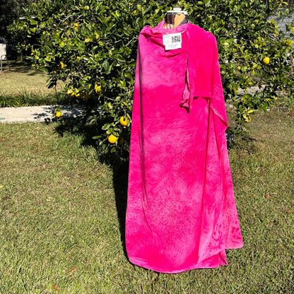 A SPLADDER DYED PINK PIECE OF FABRIC