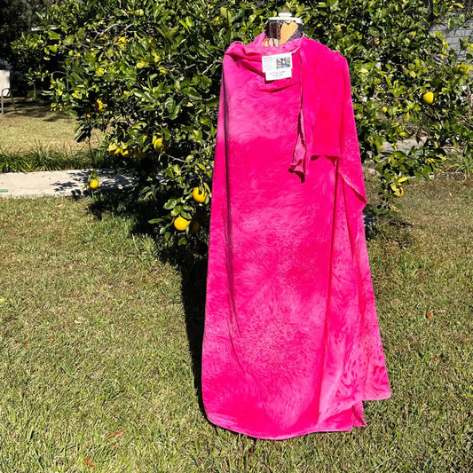 A SPLADDER DYED PINK PIECE OF FABRIC
