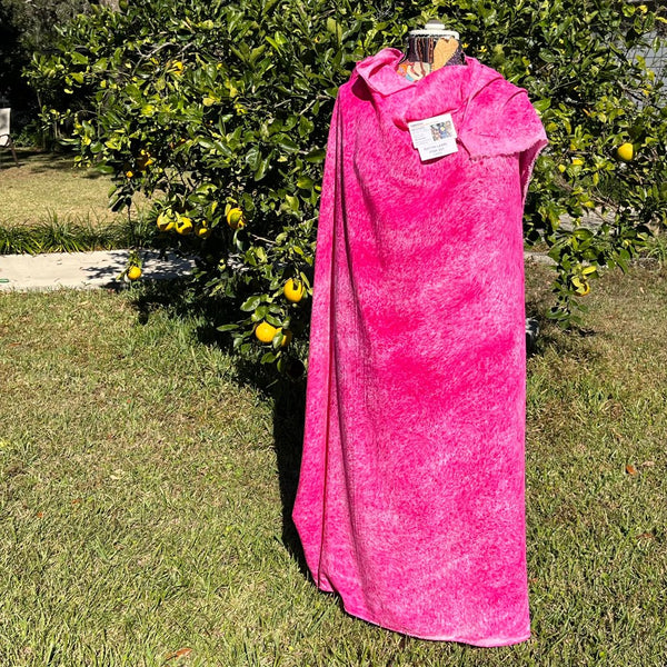 A SPLADDER DYED PINK PIECE OF FABRIC