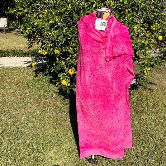 A SPLADDER DYED PINK PIECE OF FABRIC