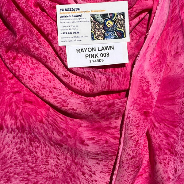 A SPLADDER DYED PINK PIECE OF FABRIC