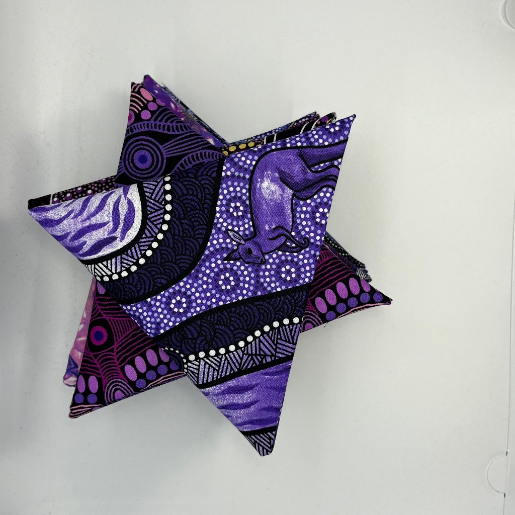 Australian Aboriginal Fabric designs in all kinds of wonderful hues and tones of purples!