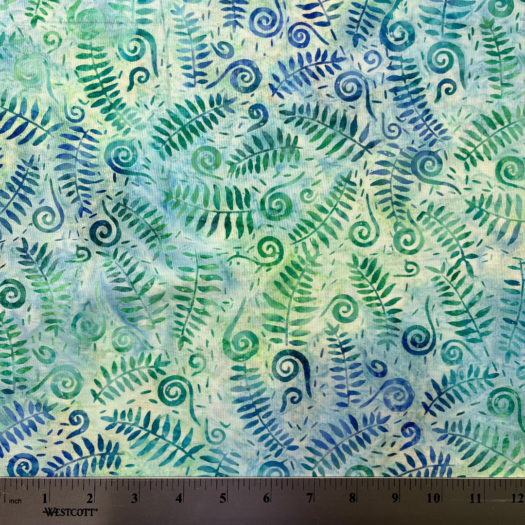 Fern leaf pattern fabric with a ruler at the bottom for scale