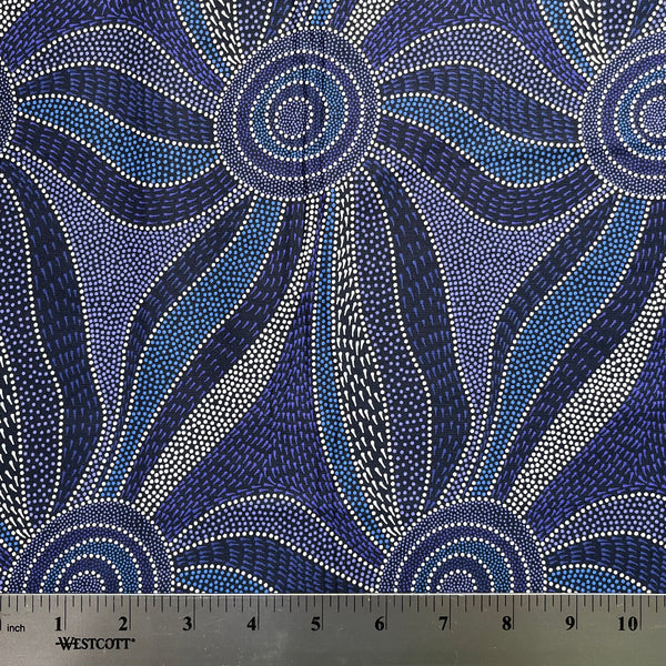 Blue and white patterned fabric with a ruler for scale