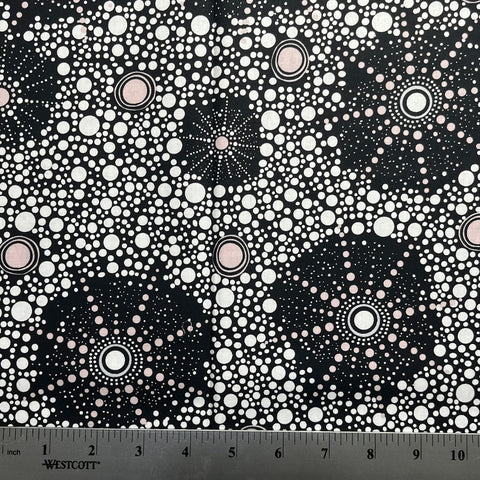Black and white patterned fabric with a ruler at the bottom