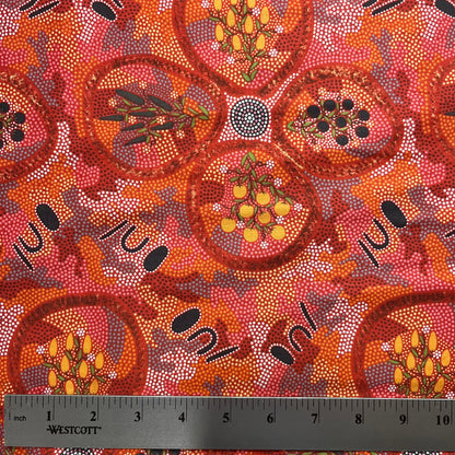 Textile with Aboriginal art pattern and ruler for scale