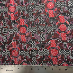 Geometric design in red, black and white with ruler