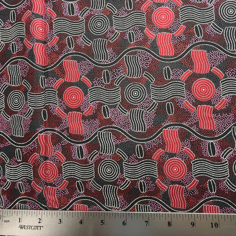 Geometric design in red, black and white with ruler