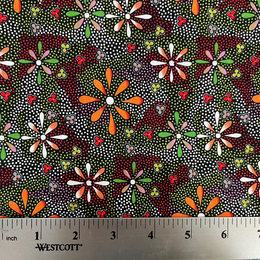 Colorful floral pattern fabric with a ruler for scale, featuring Westcott brand.