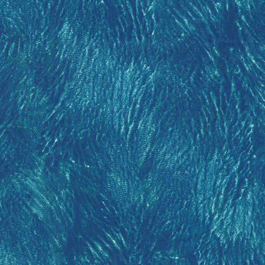 sapphire blue, turquoise, light sea glass ripples on the surface of the water, with tiny white accents
