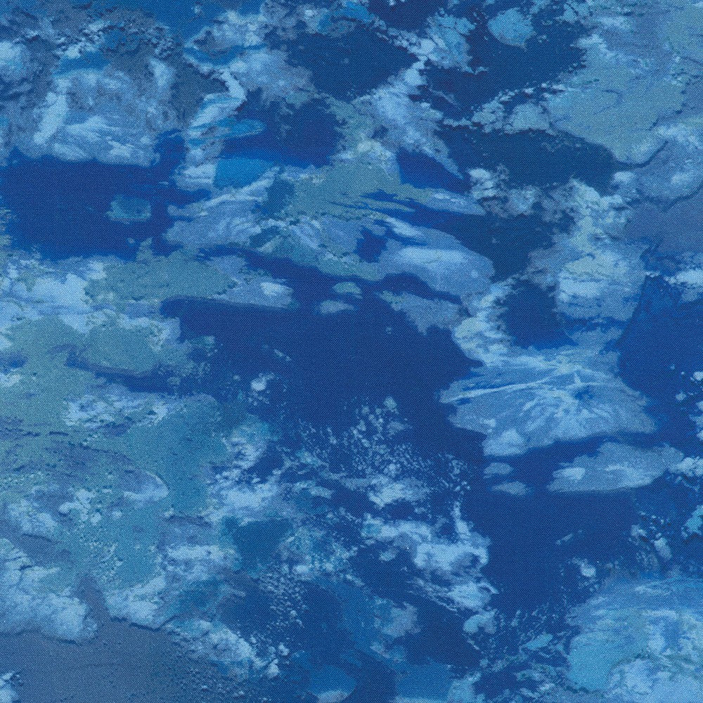 medium blues and grey overlays representing ocean seen from high above