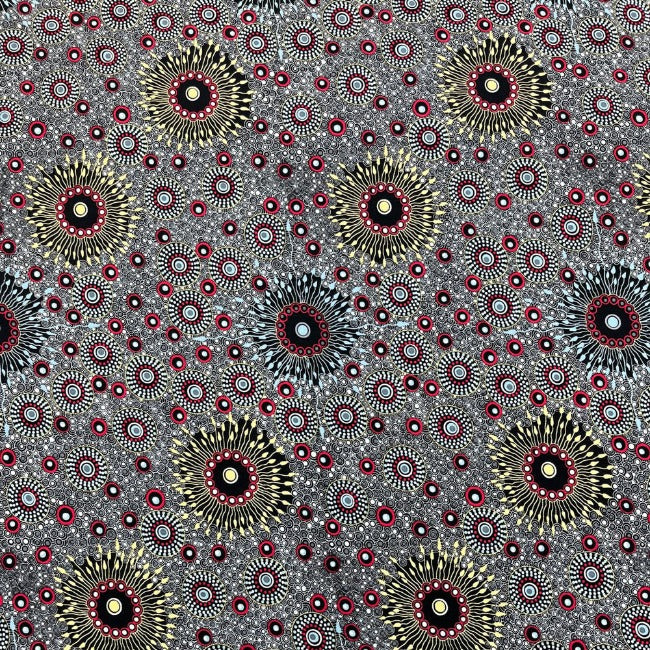 Onion Dreaming 2 Rayon in black is a striking design of circles in red, white, black and tan on a grey background.&nbsp;