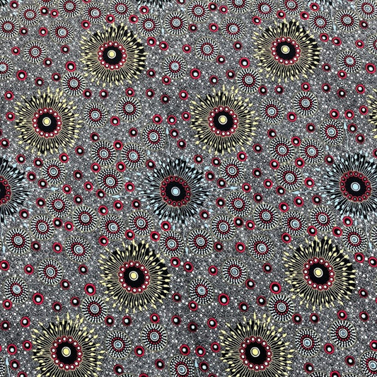 Onion Dreaming 2 Rayon in black is a striking design of circles in red, white, black and tan on a grey background.&nbsp;