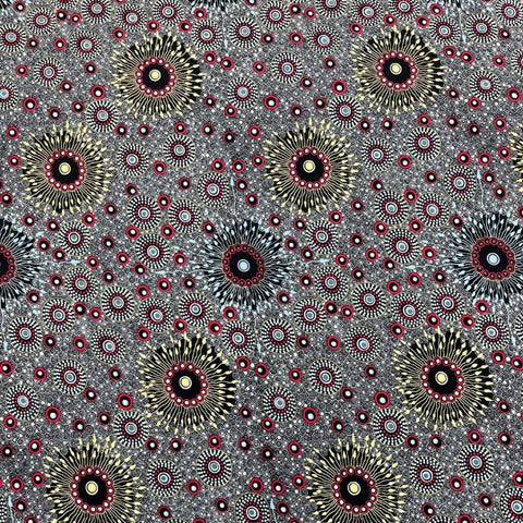 Onion Dreaming 2 Rayon in black is a striking design of circles in red, white, black and tan on a grey background.&nbsp;