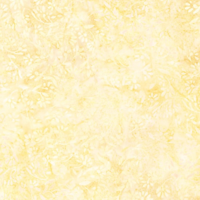  Pastel Petals - Canteloupe is a dainty batik design in the softest shades of gold, peach, cream and buttermilk, depicting faint flowers. 