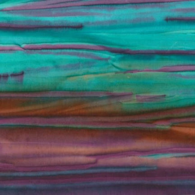 Luminous handpainted stripes in purples, browns, turquoise, emerald run from selvage to selvage.