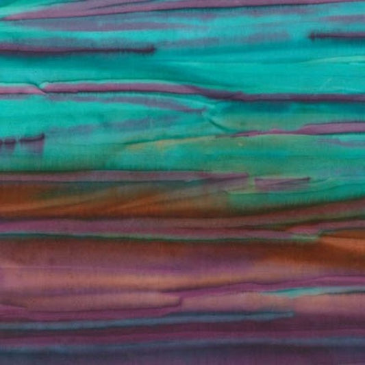 Luminous handpainted stripes in purples, browns, turquoise, emerald run from selvage to selvage.