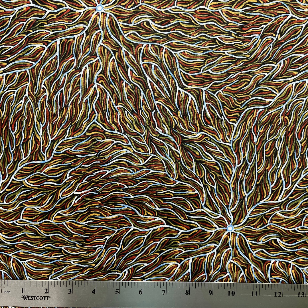 Running Water Dreaming&nbsp; brown is an intricate design of fine lines in white, brown, beige and black, simulating the rivulets of water splashing from a central waterhole.