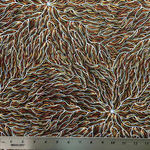 Running Water Dreaming&nbsp; brown is an intricate design of fine lines in white, brown, beige and black, simulating the rivulets of water splashing from a central waterhole.