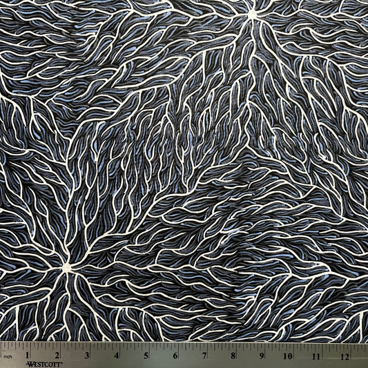 Running Water Dreaming grey is an intricate design of fine lines in white, grey and purplish grey on a black background, simulating the rivulets of water splashing from a central waterhole.