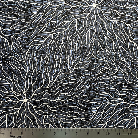 Running Water Dreaming grey is an intricate design of fine lines in white, grey and purplish grey on a black background, simulating the rivulets of water splashing from a central waterhole.