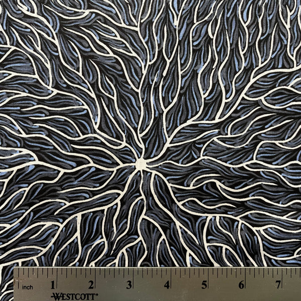 Running Water Dreaming grey is an intricate design of fine lines in white, grey and purplish grey on a black background, simulating the rivulets of water splashing from a central waterhole.