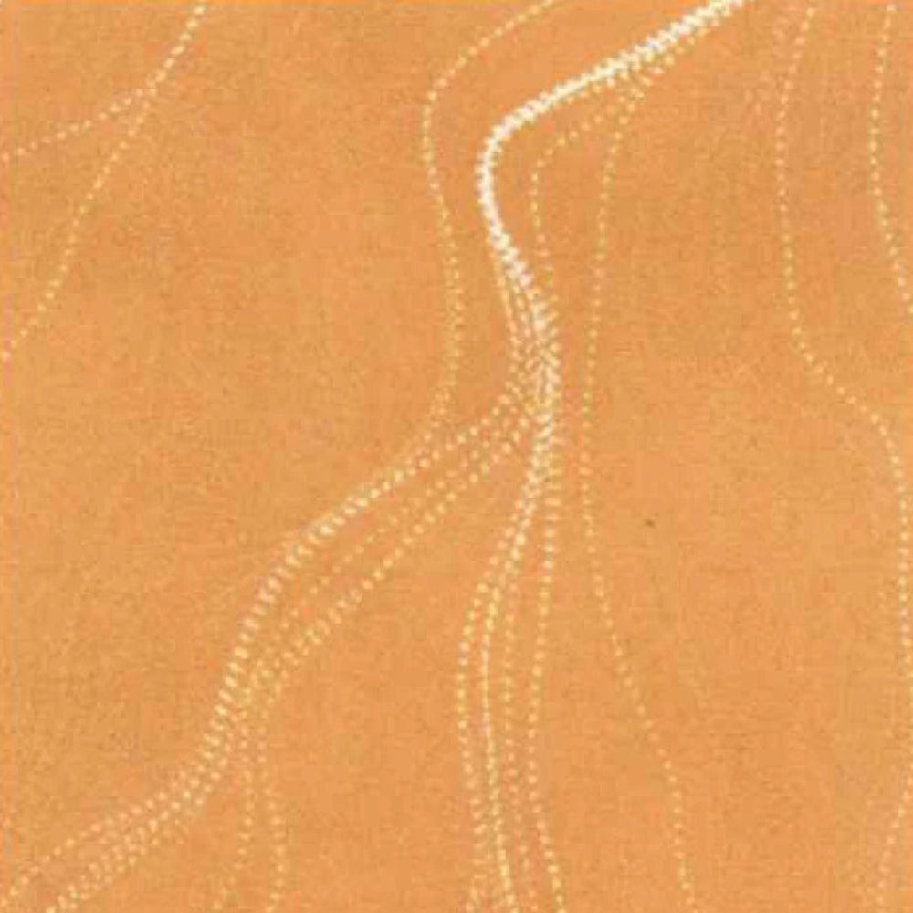 A close-up of a warm tan or camel-colored textured surface with irregular pale dotted lines running across it.