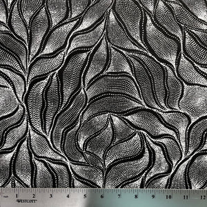 Sandhill and Waterhole Black&nbsp;is a striking design by Aboriginal artist Anna Pitjara, featuring intricate white motifs on a deep black background.