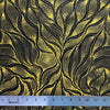 Sandhill and Waterhole Gold&nbsp;is a striking design by Aboriginal artist Anna Pitjara, featuring intricate golden yellow motifs on a deep black background.