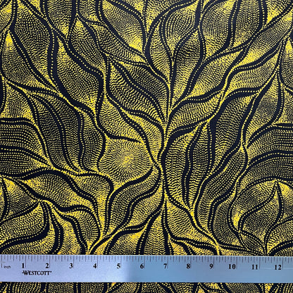 Sandhill and Waterhole Gold&nbsp;is a striking design by Aboriginal artist Anna Pitjara, featuring intricate golden yellow motifs on a deep black background.