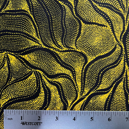 Sandhill and Waterhole Gold&nbsp;is a striking design by Aboriginal artist Anna Pitjara, featuring intricate golden yellow motifs on a deep black background.