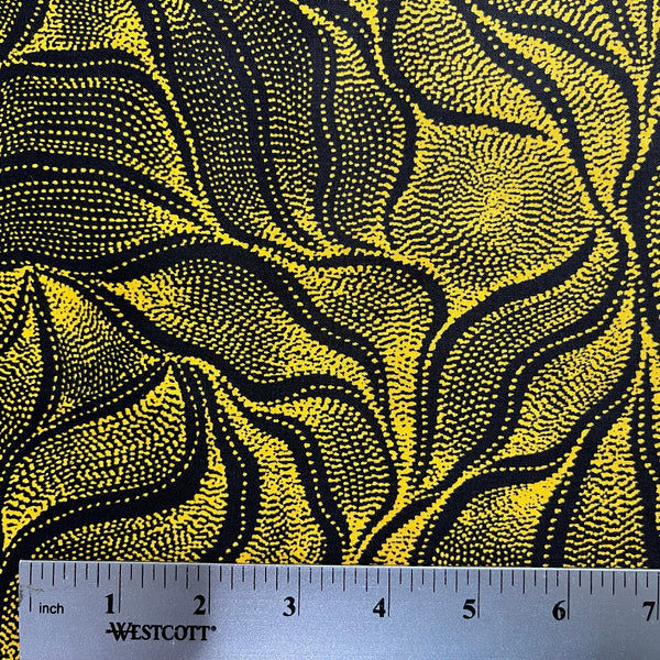 Sandhill and Waterhole Gold&nbsp;is a striking design by Aboriginal artist Anna Pitjara, featuring intricate golden yellow motifs on a deep black background.