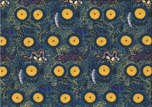 Snake Goanna Bush Tucker blue Australian fabric by Wally Evans is a quirky design, featuring goannas, snakes, berries and grubs in blues and sunny orange on a blue-grey and yellow background, with blue and yellow circles (water holes?) completing the picture. 